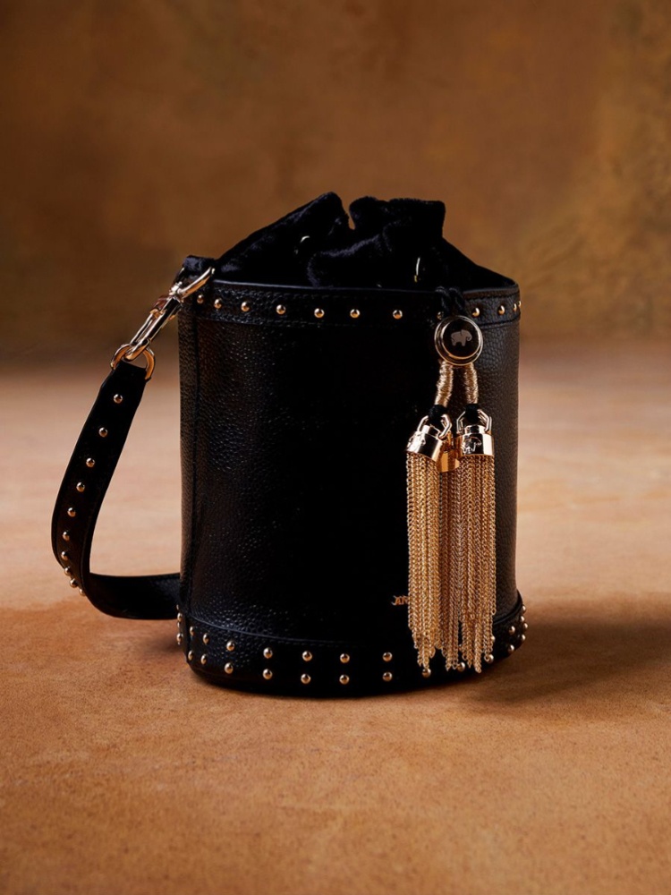 A black bucket bag made of vegan leather by Anita Dongre