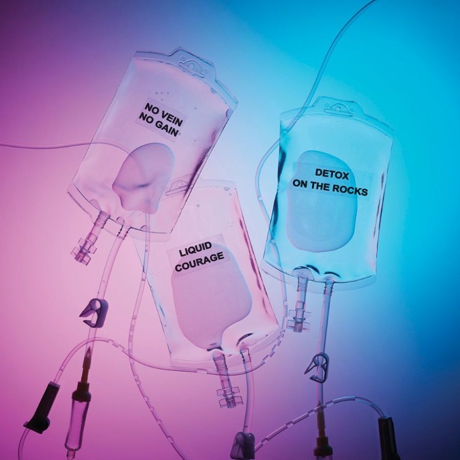 Bags of IV fluid representing wellness drips