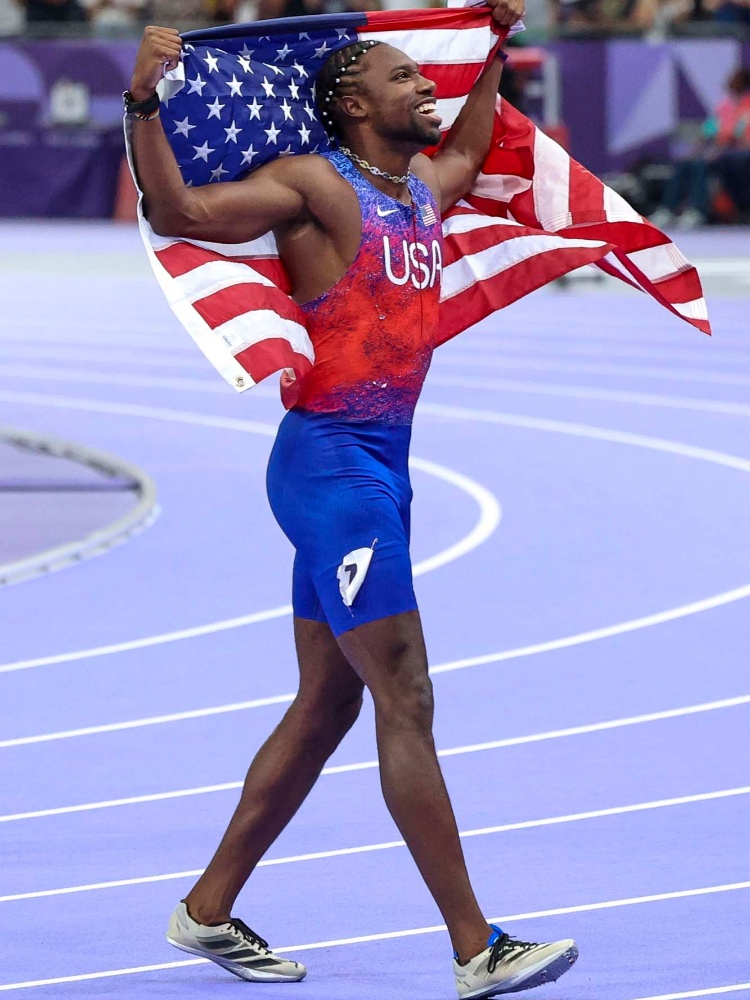 Noah Lyles wearing his winning Adidas Adizero Y-3 spikes